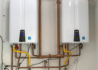 Tankless water heaters connected to pipes