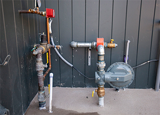 Plumbing connected to a water meter